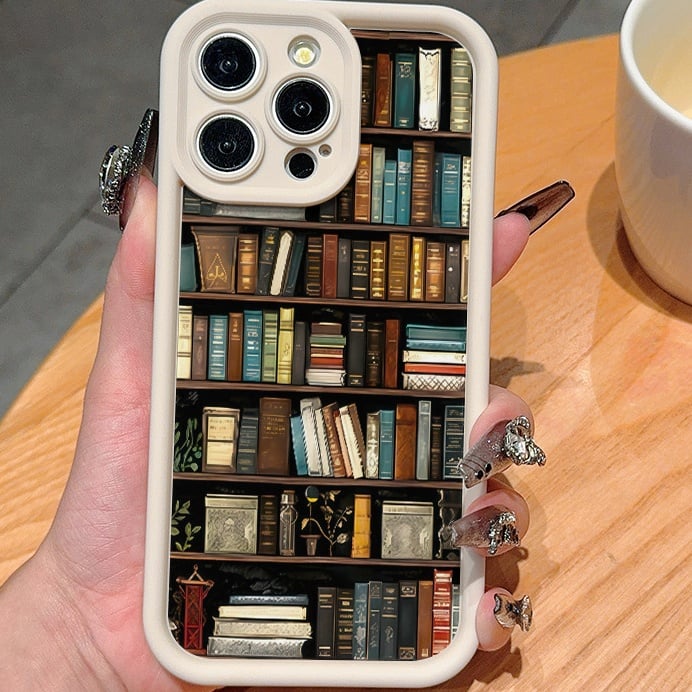 🔥2025 UUSI UUSI📚📱TPU-puhelinkotelo, jossa on piirretty kirjahyllykuvio