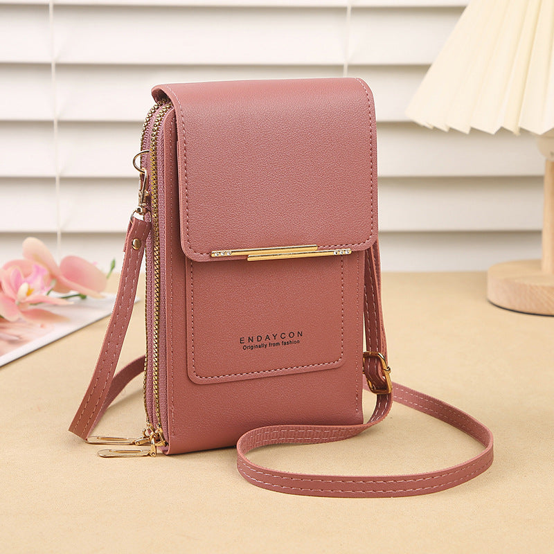 👜📱 Simple and elegant touchscreen phone bag for women, designed to be worn over the shoulder.