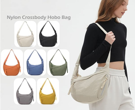 🔥Modische Umhängetasche aus Nylon in Unifarbe/🔥Fashionable shoulder bag made of nylon in plain color